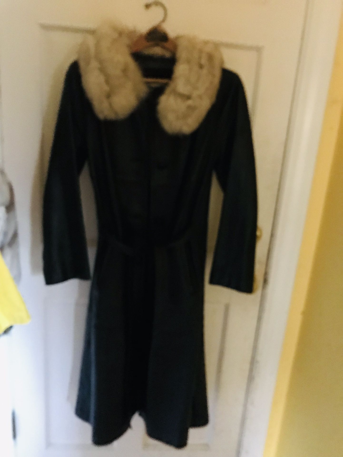 Leather coat with real fur collar