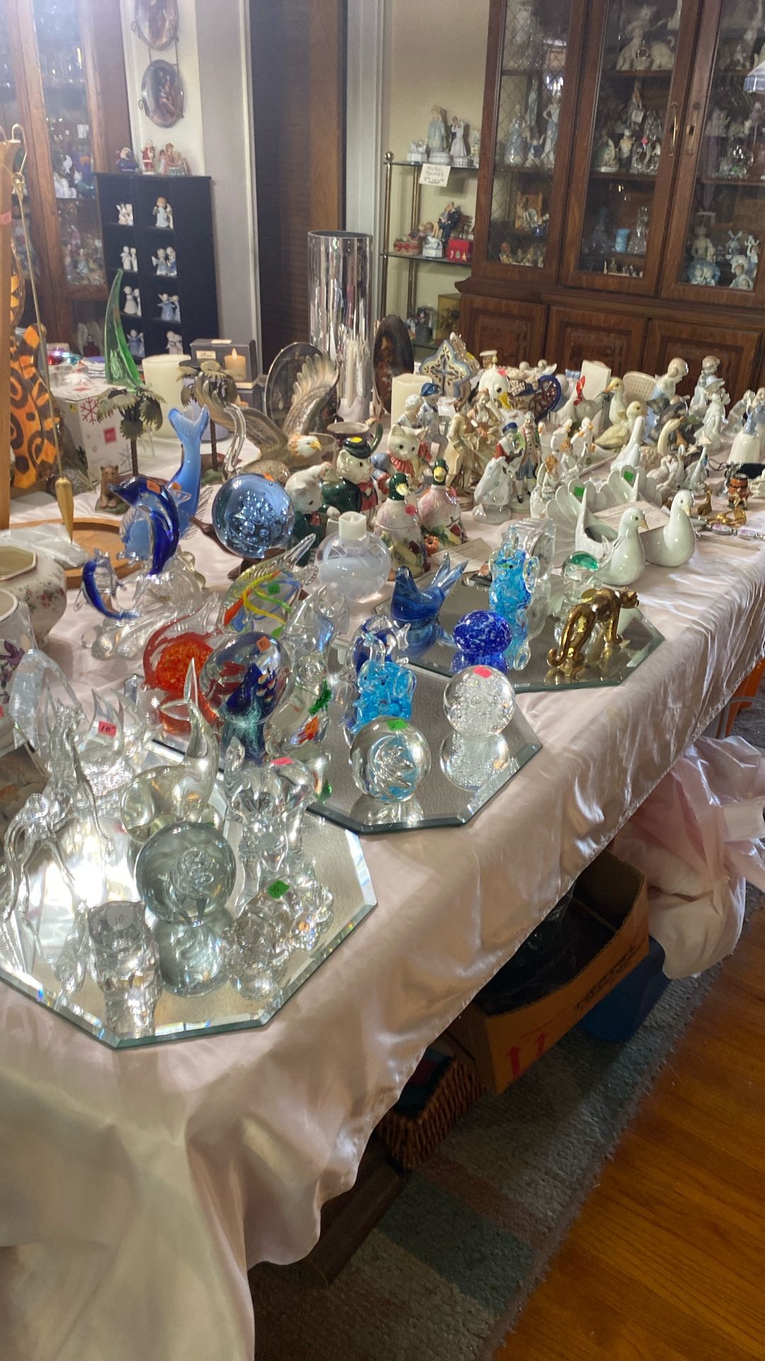Table Of Collectibles. Fitz And Floyd, Lennox, Murano, and figurines. See all pictures inquire if interested. Various prices.