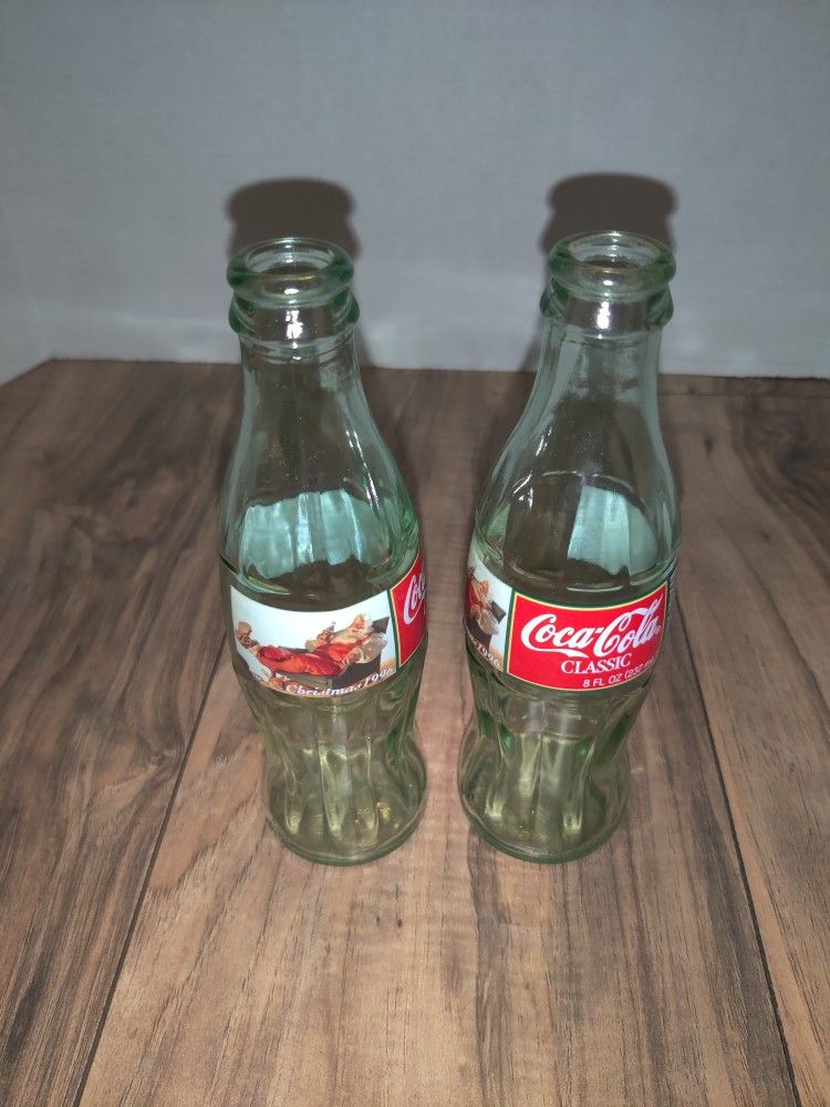 Coke Coca Cola 8 ounce 1996 Christmas Glass Empty Bottle featuring Santa Claus
