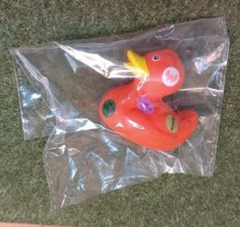 Whataburguer Mini dot day rubber duck 2" squeaks.