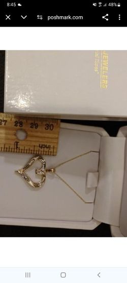 REAL 10 KT GOLD NECKLACE WITH DIAMOND HEART AND PENDANT FROM FRED MEYERS JEWELRY STORE