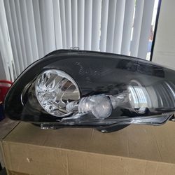 Hella brand headlight for a Volkswagen Golf,  MK6 model (e.g., 2011 VW Golf GTI)
