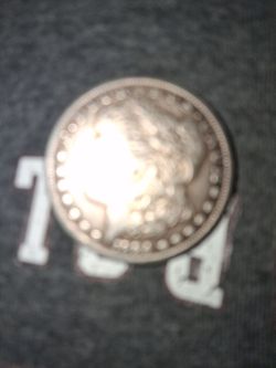 1884 Morgan silver dollar