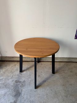 IKEA round wood dining room table