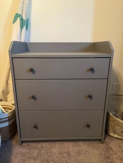 Small grey dresser.