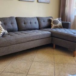 New Reversible Sectional.  Grey.  86”x59”X. Free Delivery!