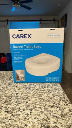 Raised toilet seat