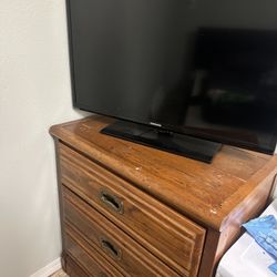 Wooden Dresser With Samsung  Tv 