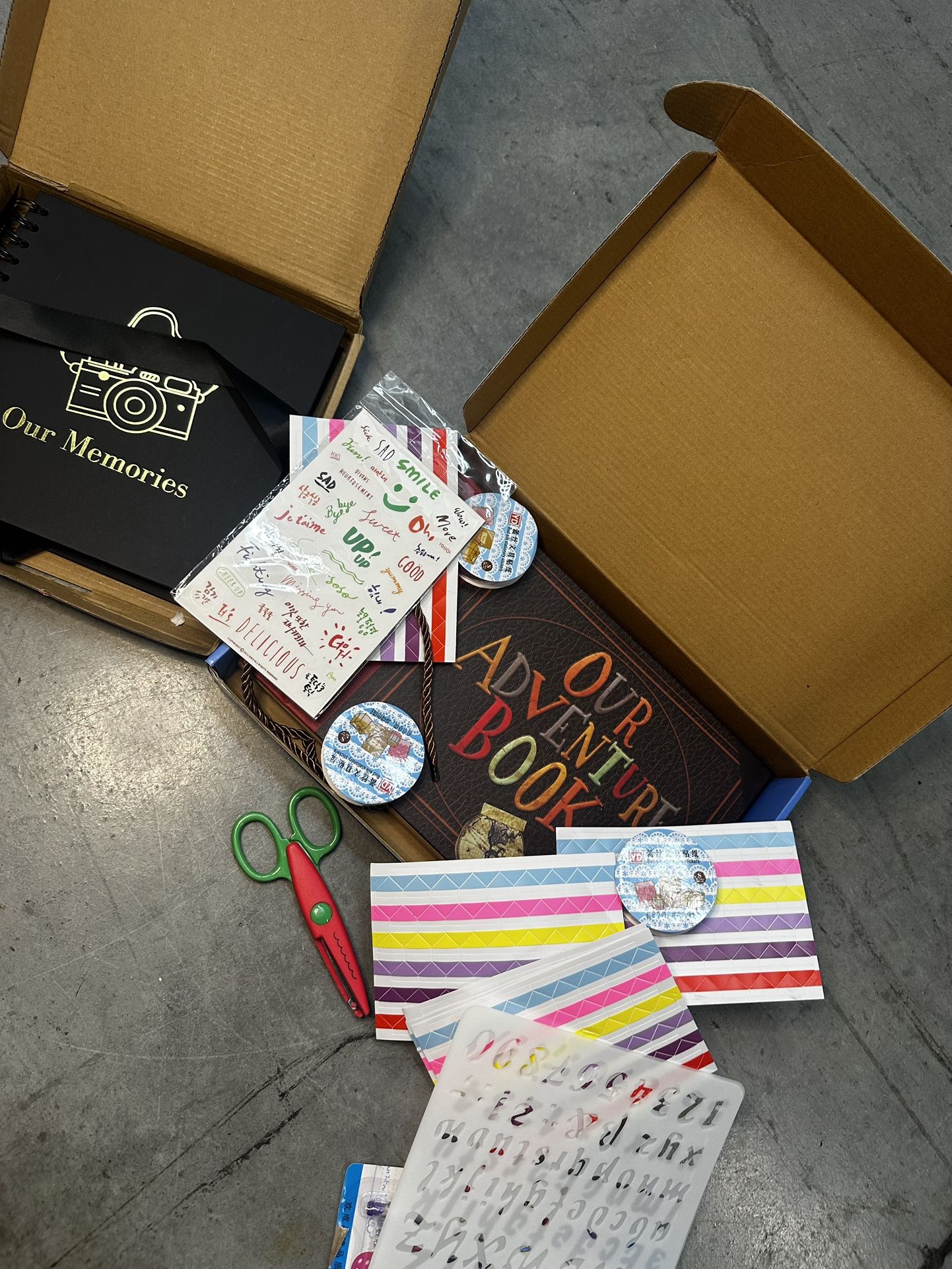 Includes 'Our Adventure Book', And ‘Our Memories' album, stickers, and scissors accessories