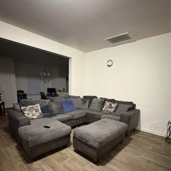 3pc Livingroom Set Gray Sectional W Chaise Storage Ottoman and Swivel Chair free end tables and wall decor