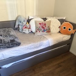 gray twin sized day bed with trundle