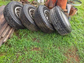 Set of 4 Used Tires on Steel Rims