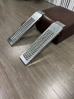 $45 (40” long x 9” wide) parallel ramps for your trailer. Shed, sidewalk or other place you need to load on to / 1000 pound capacity