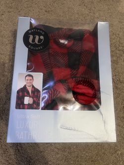 2 robes unopened (a men’s and a women’s)