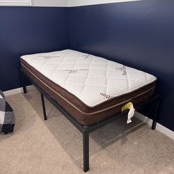 Metal twin bed frame with mattress