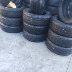265/65R17 BRIDGESTONE A SET OF FOUR USED TIRES, INCLUDES MOUNTING AND BALANCING