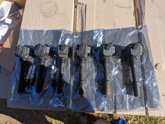 Ignition Coil & Spark Plugs Bmw 540i (NOT OEM)