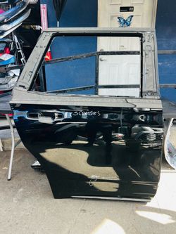 Cadillac Escalade 2021-2025 right passenger side rear door Oem