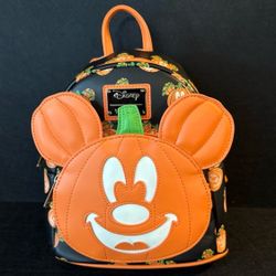 Loungefly Mickey Mouse Jack o Lantern glow in the dark backpack