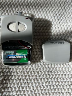 Garage door remote clicker