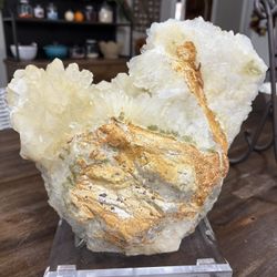 Large yellow calcite with epidote and clear quartz specimen with stand