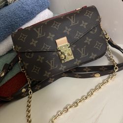Pochette Métis East West lv