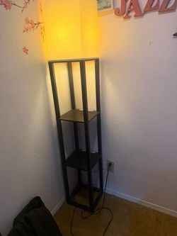 Floor lamp with shelves
