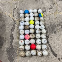 50 used golf balls