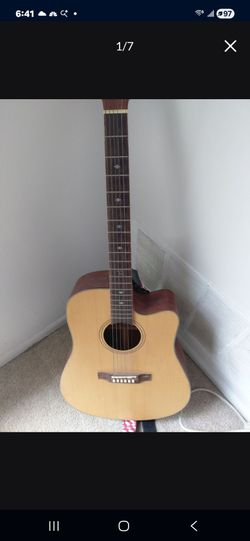 Acustic Guitar Best in person offers no trades cash only please do not contact us after 8pm