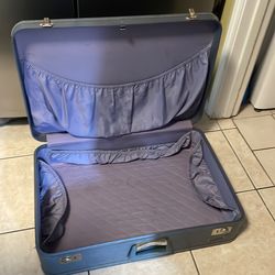 Large vintage light blue Monarch suitcase