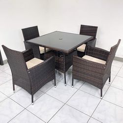 (NEW) $250 (5pcs) Wicker Dining Set Outdoor Patio Furniture 35x35” Glass Table with Umbrella Cutout, 4 Chairs 