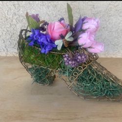  SHOE VINTAGE FLORAL ARRANGEMENT.             $35.00