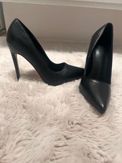 Brand new black pumps