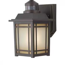 Port Oxford 10.6 in. 1-Light Oil Rubbed Chestnut Motion Sensing Hardwired Outdoor Wall Light Lantern Sconce