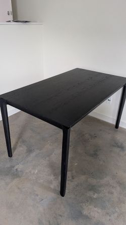 Solid wood table. Matte black. Industry Designs.