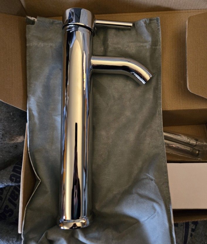 Brand new! Single hole bathroom faucets for vessel sink with supply lines and pop up drain assembly. New in box, set of 2.