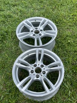 Genuine BMW 18-inch M Star-Spoke 400 alloy wheel designed for chassis models like the F30, F31, F32, F33, F34, and F36