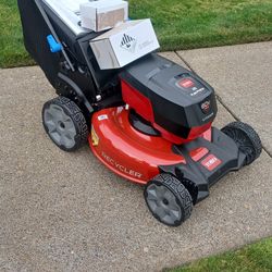 Brand New Toro 60 Volt Battery Operated Lawn Mower Includes Battery And Charger