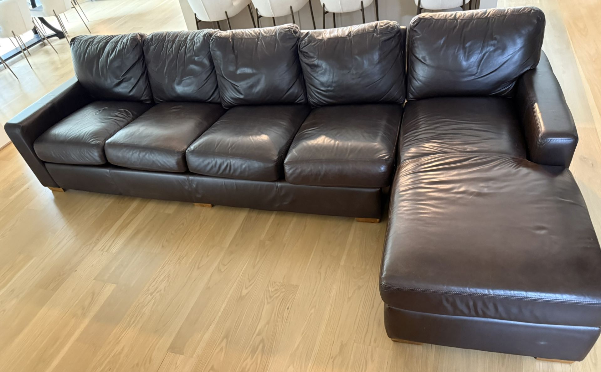 134” right-facing chaise aniline-dyed leather sectional