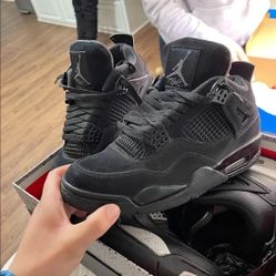Black Cat Jordan 4s