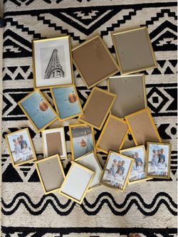 Assorted gold photo frames