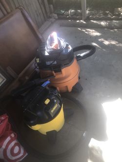 2 Vacuum Cleaners Dewalt And Rigid