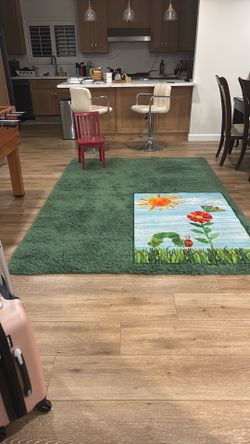 Large beautiful green rug
