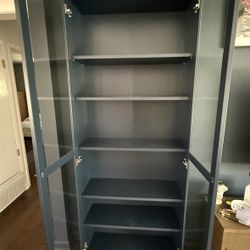 Ikea Billy Bookcase with glass doors, dark blue, 31 1/2x11 3/4x79 1/2 "