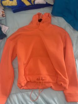 bright orange sweater