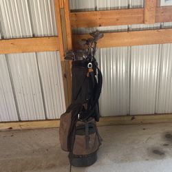 A Whole Set Of Golf Clubs And Bag