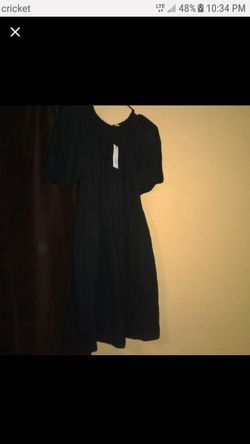 Super cute black small babydoll dress runs bigger