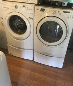 Whirlpool washer and dryer set on pedestals/ one year warranty/ delivery and installation are available