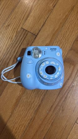 Light blue Instamax mini 7S with purse case