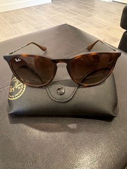Ray-Ban Erika sunglasses featuring a tortoise shell frame and gradient brown lenses.